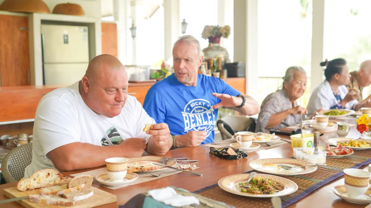 Residents spending time together in an Elder Blossom communal space